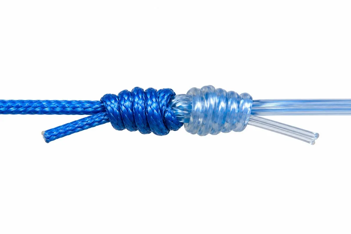 A double uni knot joining braided line to a clear fluorocarbon leader