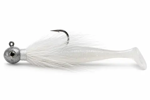 A bucktail jighead rigged with a white paddle-tail soft plastic