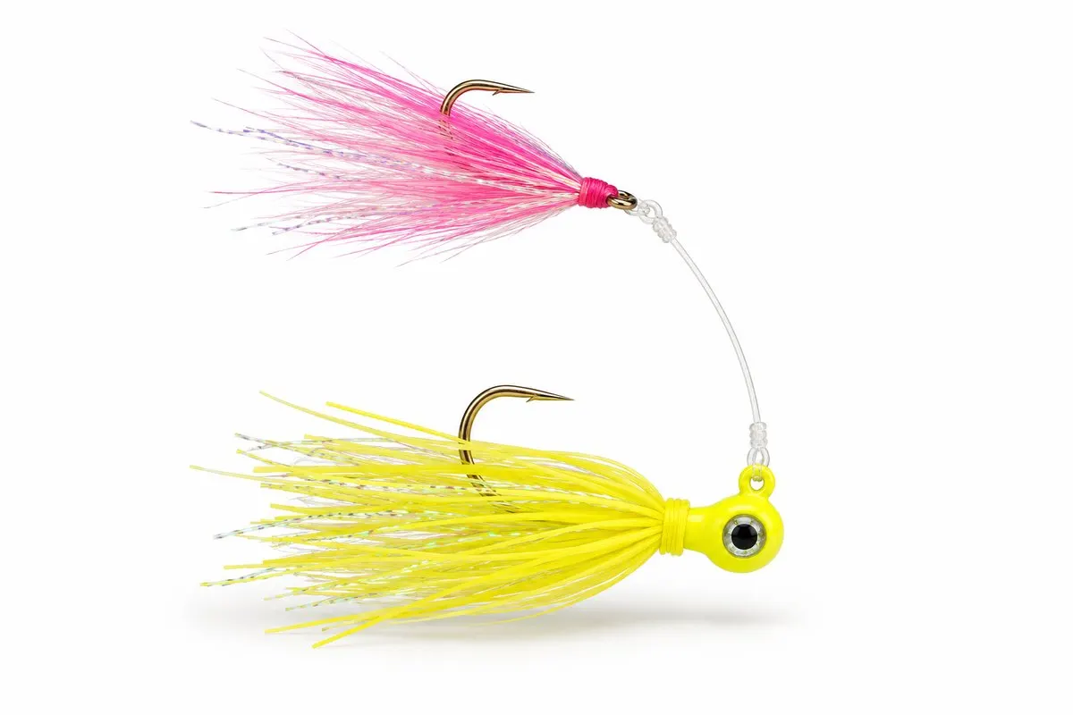 A yellow pompano jig with a pink teaser fly
